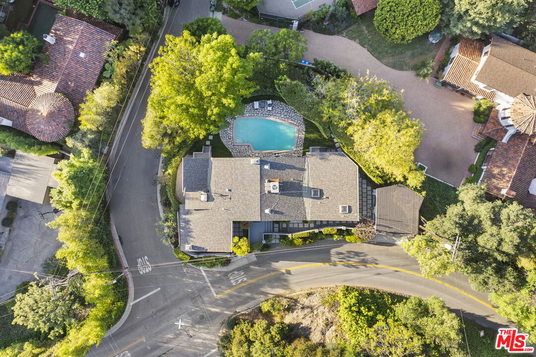 2601 Nichols Canyon Road Los Angeles, CA 90046 - Photo 27 of 28 an aerial view of a house with a yard swimming pool and patio