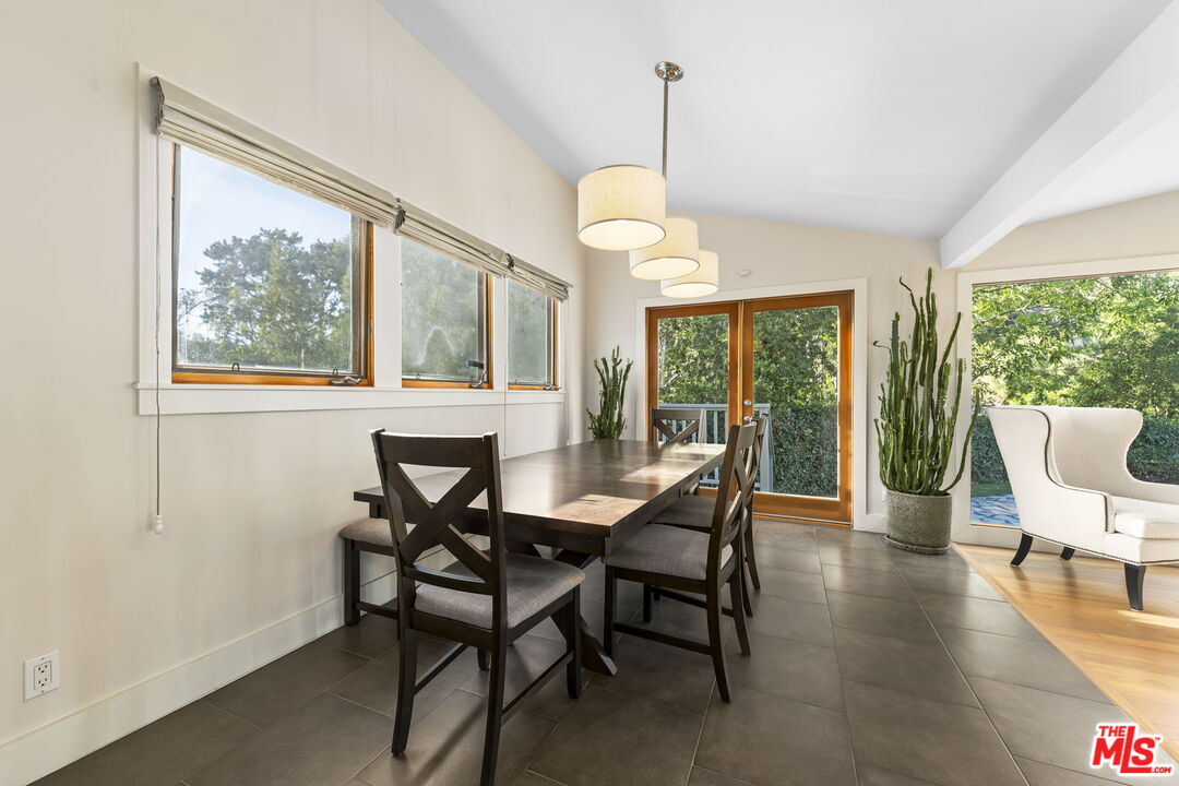 2601 Nichols Canyon Road Los Angeles, CA 90046 - Photo 8 of 28 a view of a dining room with furniture window and outside view