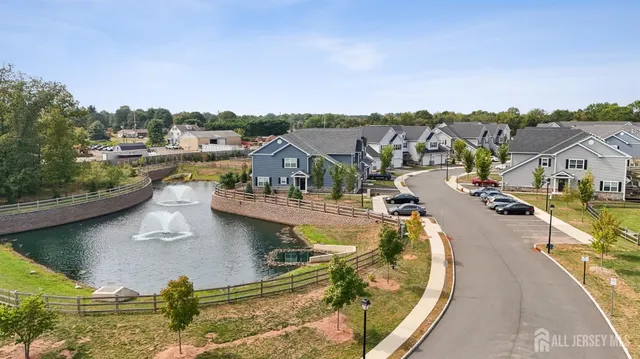 a view of a lake with a city from a lake