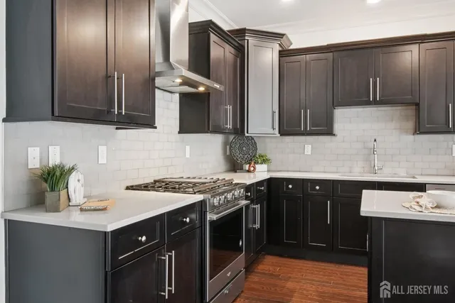 a kitchen with a sink and cabinets