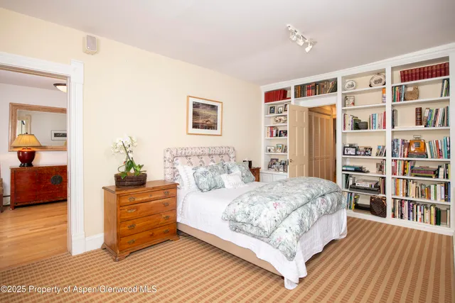 a bathroom with a sink vanity granite and a mirror