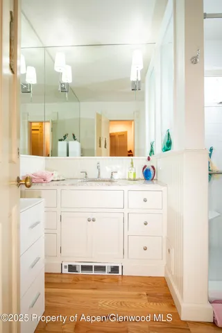 a bedroom with bed and window