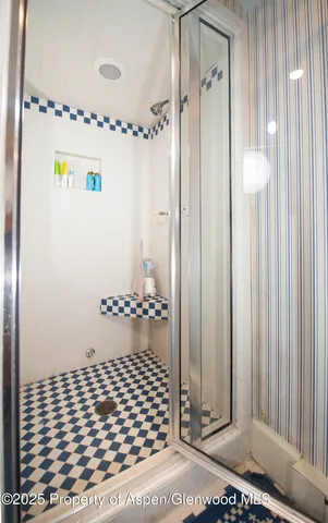 a front view of a house with outdoor seating