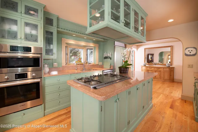 a view of a living room with a large window