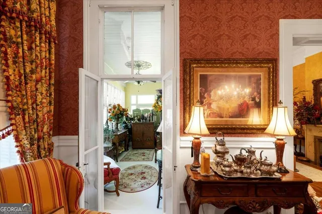 a bed room with furniture and a fireplace