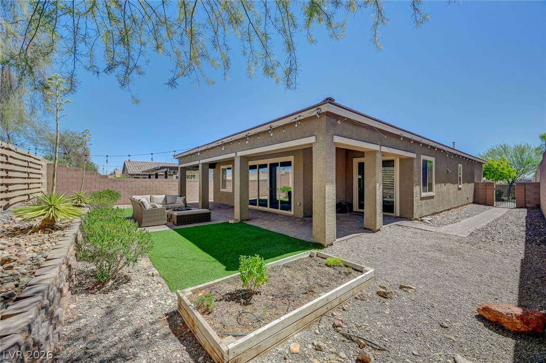 8197 Riley Love Street Las Vegas, NV 89139 - Photo 42 of 48 A private outdoor living area provides a peaceful setting for relaxation.