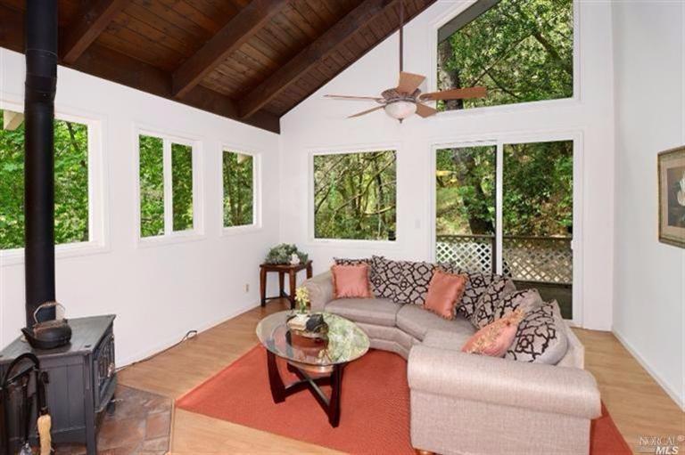 2310 Mark West Springs Road Santa Rosa, CA 95404 - Photo 1 of 1 a living room with furniture and a large window