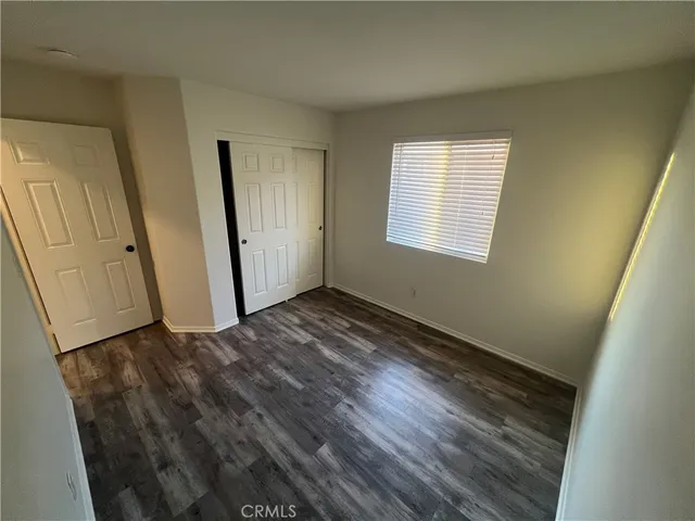 a bathroom with a toilet and a bath tub