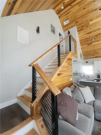 a bathroom with a sink vanity and a mirror