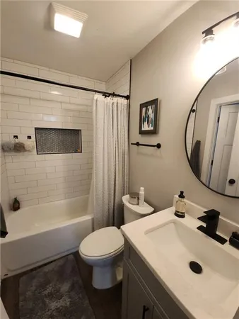 a view of a house with wooden deck