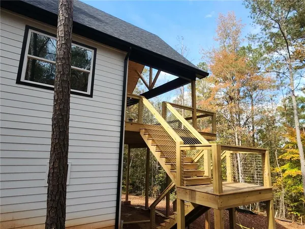 a view of outdoor space with iron fence