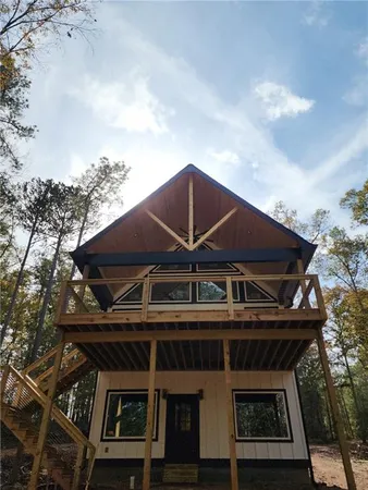 a roof deck with the table and chair