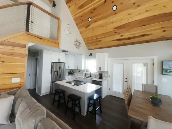a view of entryway with wooden floor