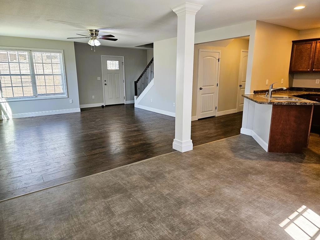 4835 Cameron Road Morristown, TN 37814 - Photo 4 of 25 an empty room with wooden floor and windows