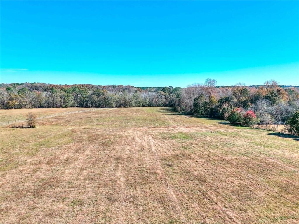 3318 Dally Road Covington, GA 30014 - Photo 7 of 10 a view of a field with an ocean view