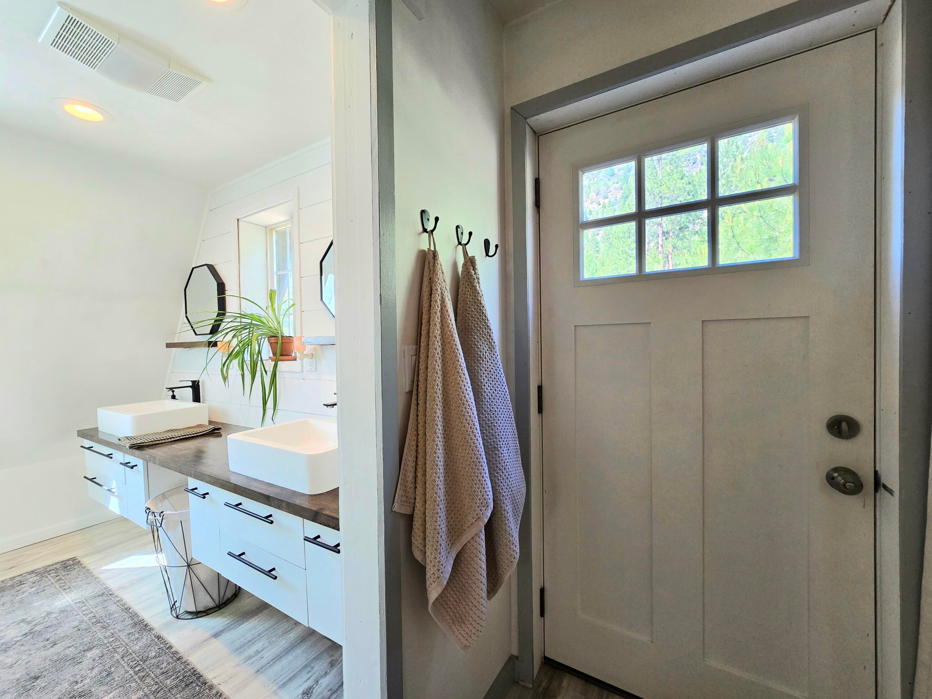 10211 Old Fort Road Klamath Falls, OR 97601 - Photo 23 of 79 primary bathroom and the back door to the hot tub