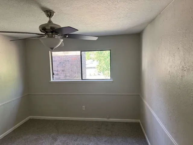 a view of a room with a window