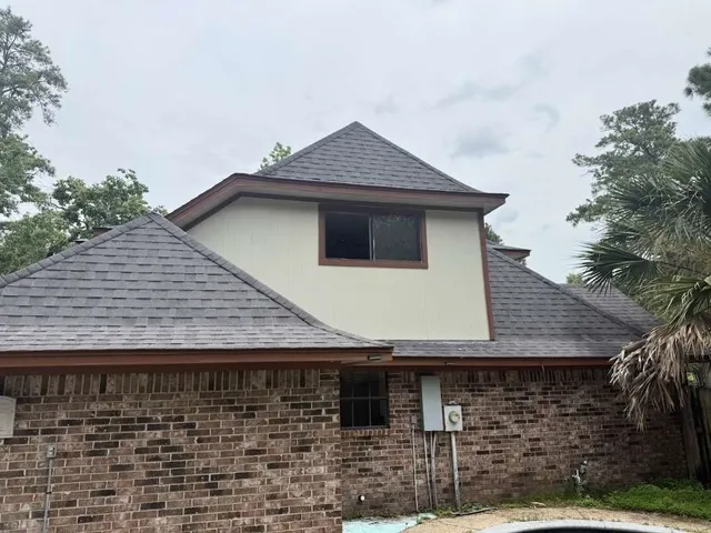 a aerial view of a house a yard