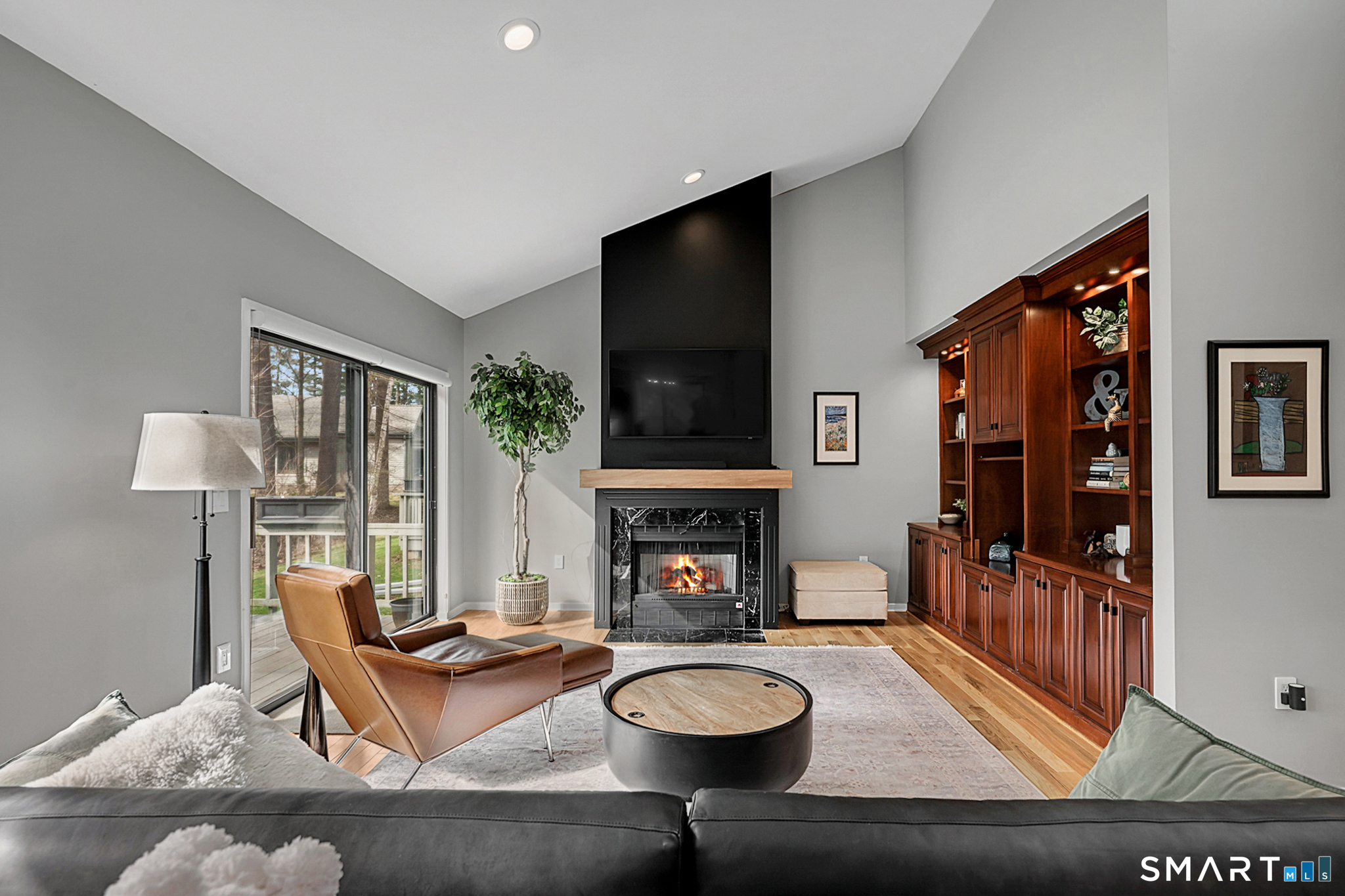 5 Vista Terrace, Unit 5 Avon, CT 06001 - Photo 1 of 1 a living room with fireplace furniture and a flat screen tv