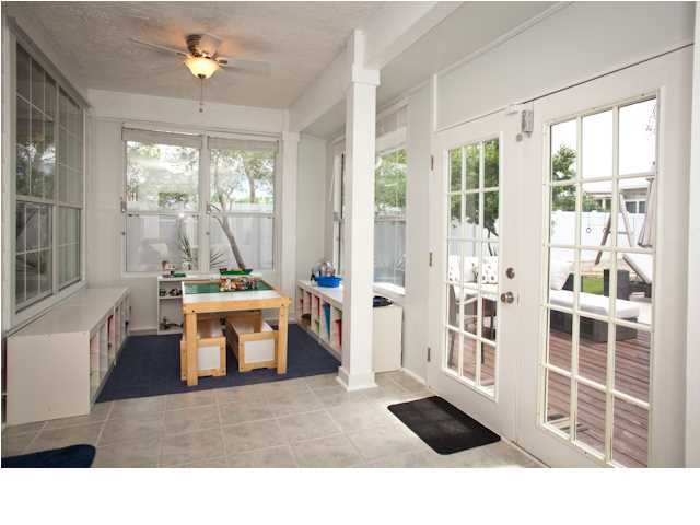 258 Seabreeze Circle Seacrest, FL 32461 - Photo 21 of 31 a living room with furniture a window and appliances