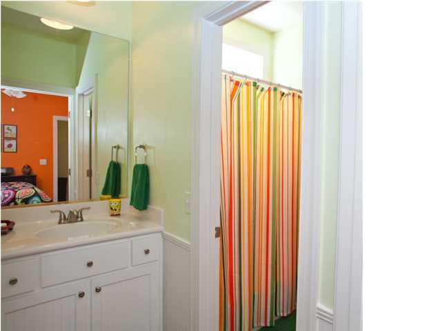 258 Seabreeze Circle Seacrest, FL 32461 - Photo 25 of 31 a bathroom with a sink and a mirror