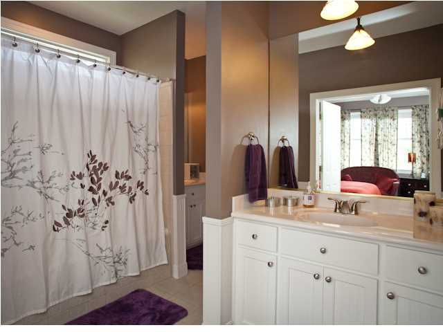 258 Seabreeze Circle Seacrest, FL 32461 - Photo 31 of 31 a bathroom with a double vanity sink mirror and shower