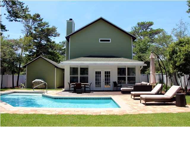 258 Seabreeze Circle Seacrest, FL 32461 - Photo 6 of 31 a view of a house with backyard porch and sitting area