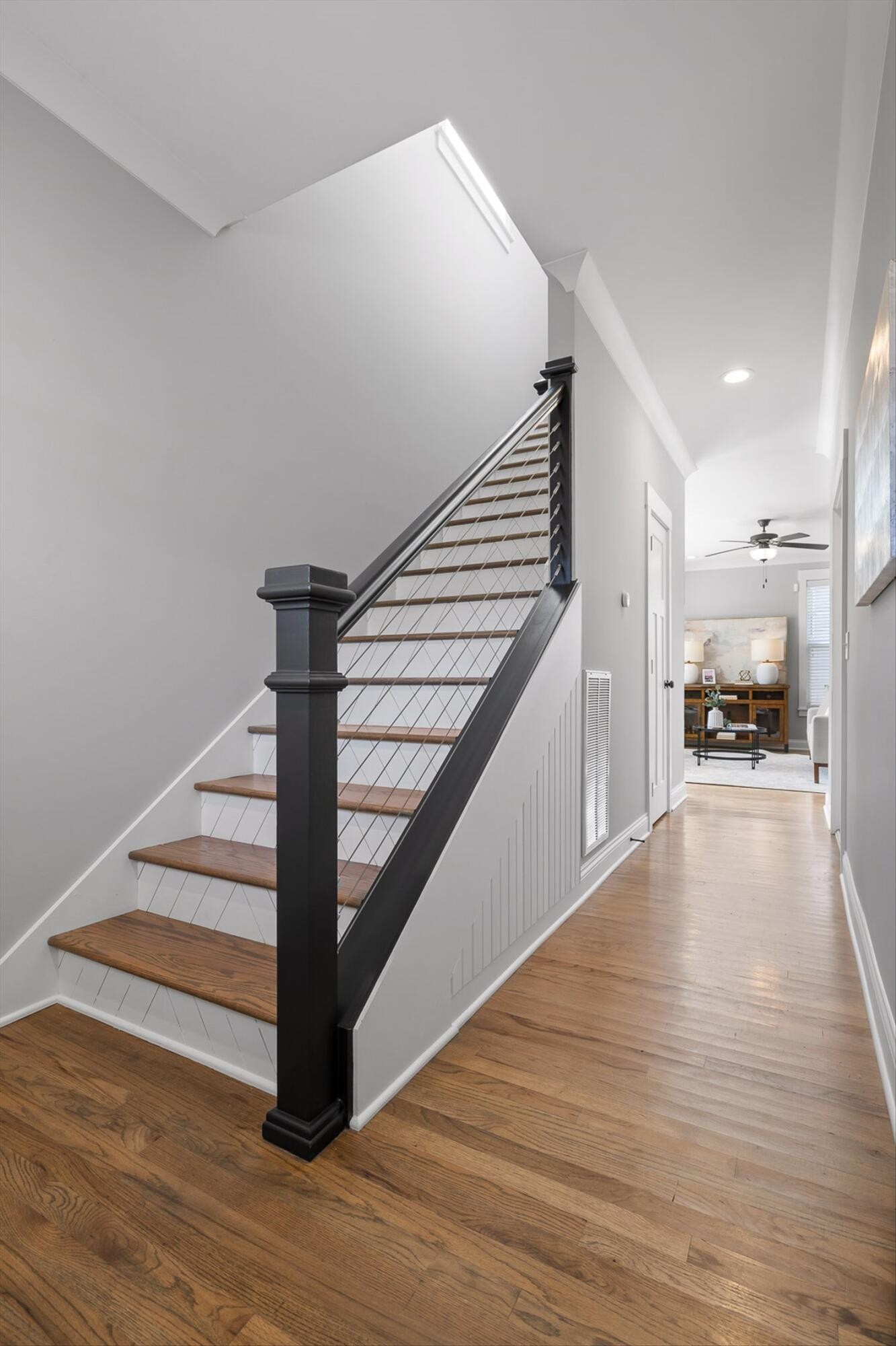 718 Windrush Loop Chattanooga, TN 37421 - Photo 16 of 29 a view of a hallway view with wooden floor and staircase