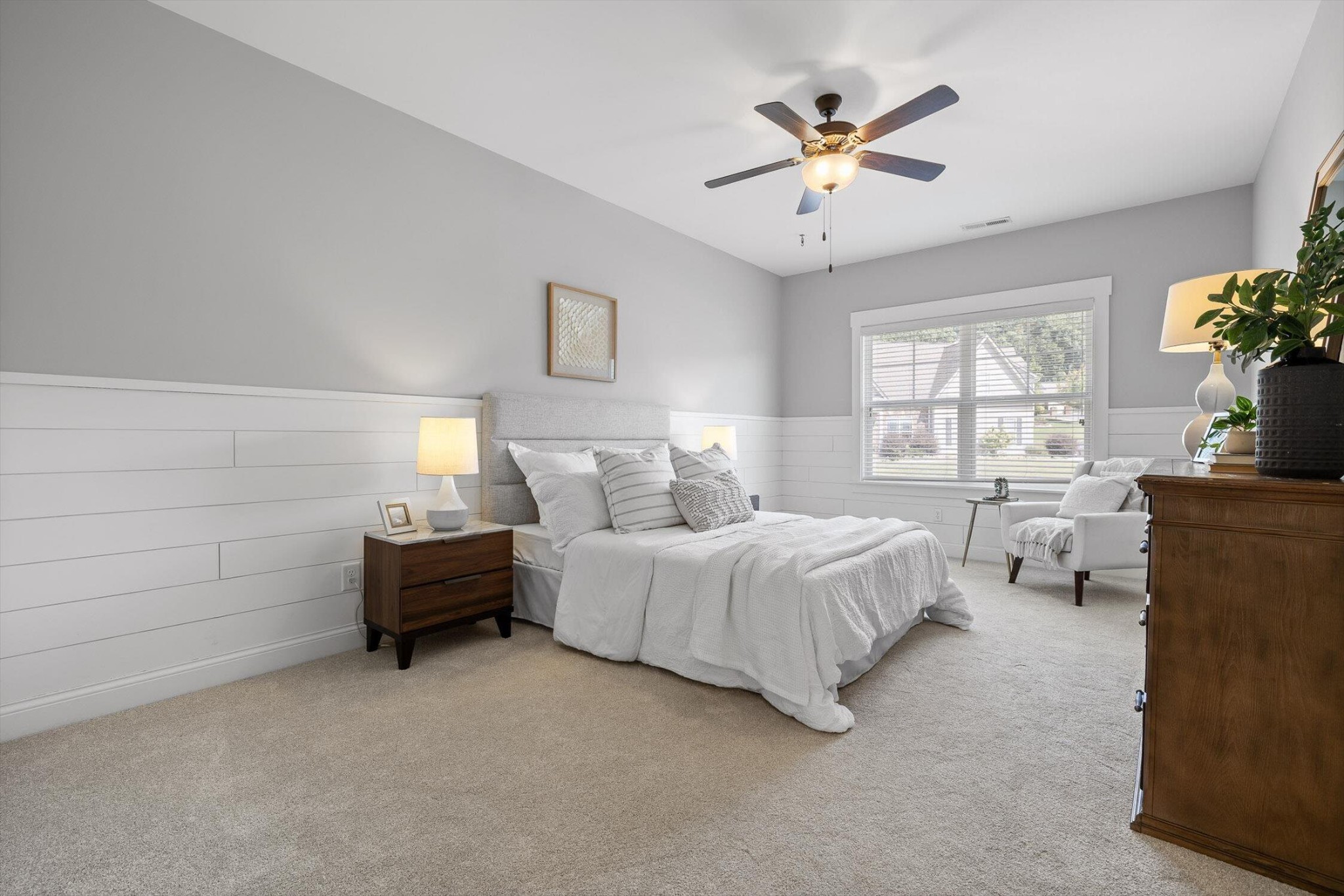 718 Windrush Loop Chattanooga, TN 37421 - Photo 17 of 29 a bed room with a bed and a ceiling fan