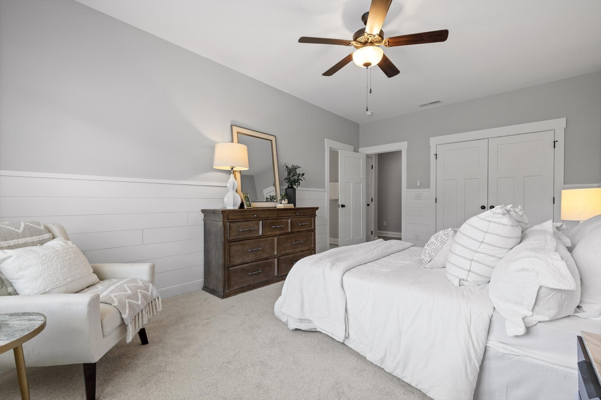 718 Windrush Loop Chattanooga, TN 37421 - Photo 18 of 29 a bedroom with bed and a chandelier