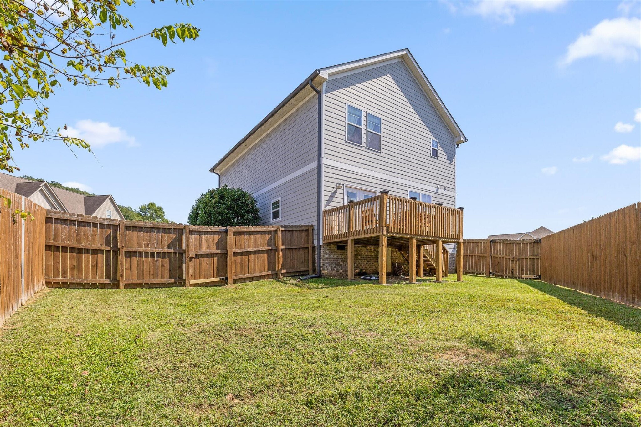718 Windrush Loop Chattanooga, TN 37421 - Photo 4 of 29 a view of a house with a yard and sitting area