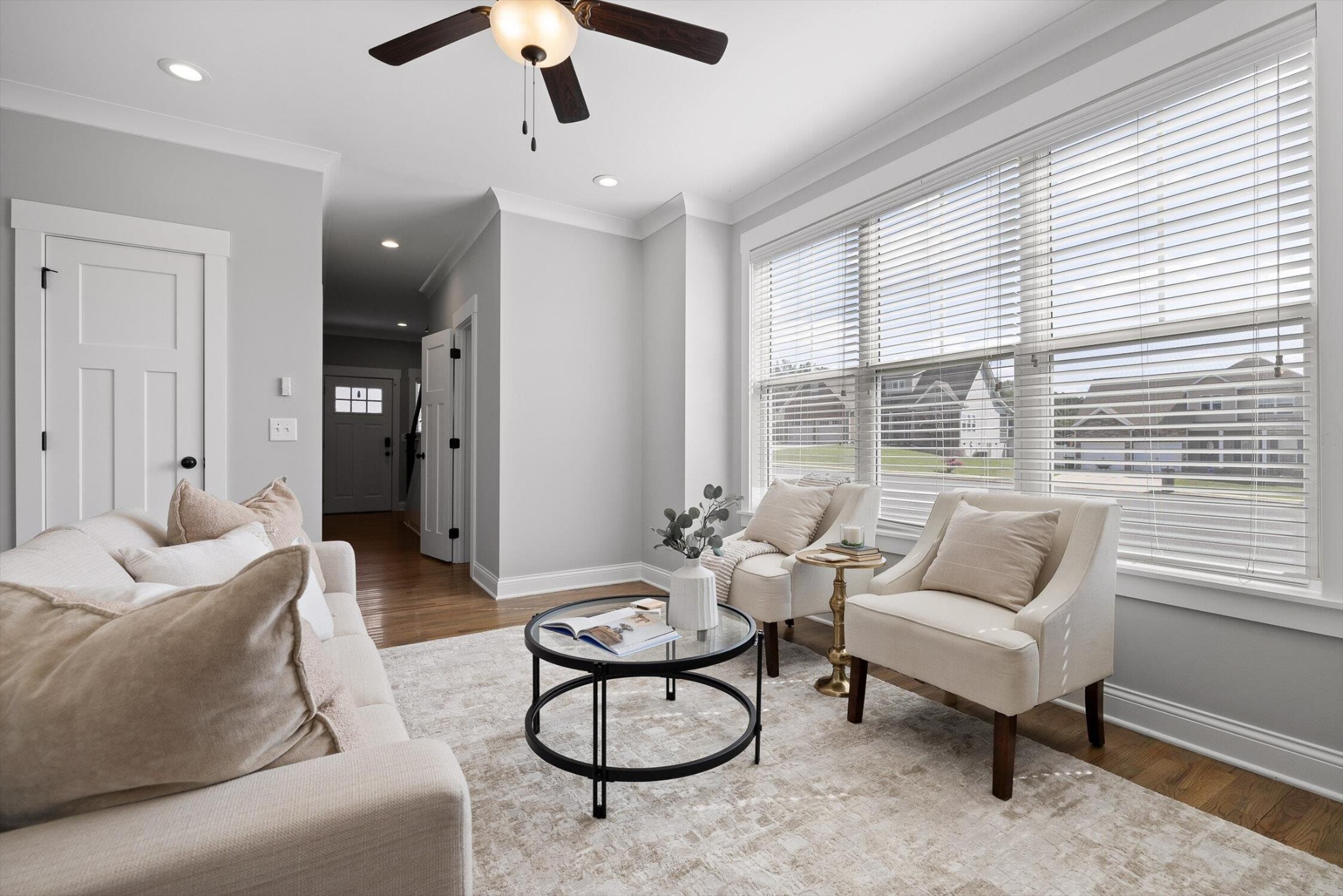 718 Windrush Loop Chattanooga, TN 37421 - Photo 10 of 29 a living room with furniture and a large window