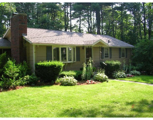 87 Old County Road Lancaster, MA 01523 - Photo 1 of 1 a view of a house with a garden and plants