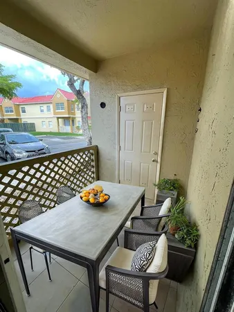 a view of a outdoor seating area with furniture