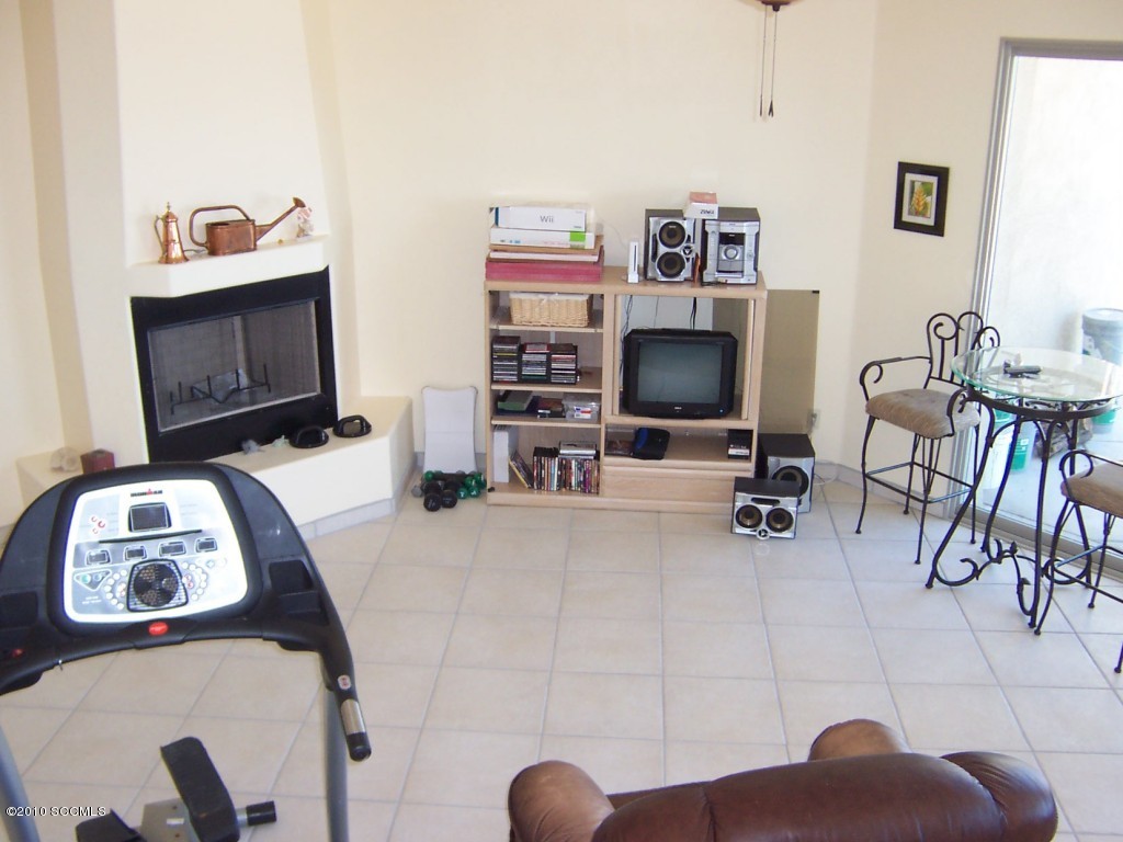 530 Ruth Lane Rio Rico, AZ 85648 - Photo 28 of 36 a view of a livingroom with furniture and a flat screen tv