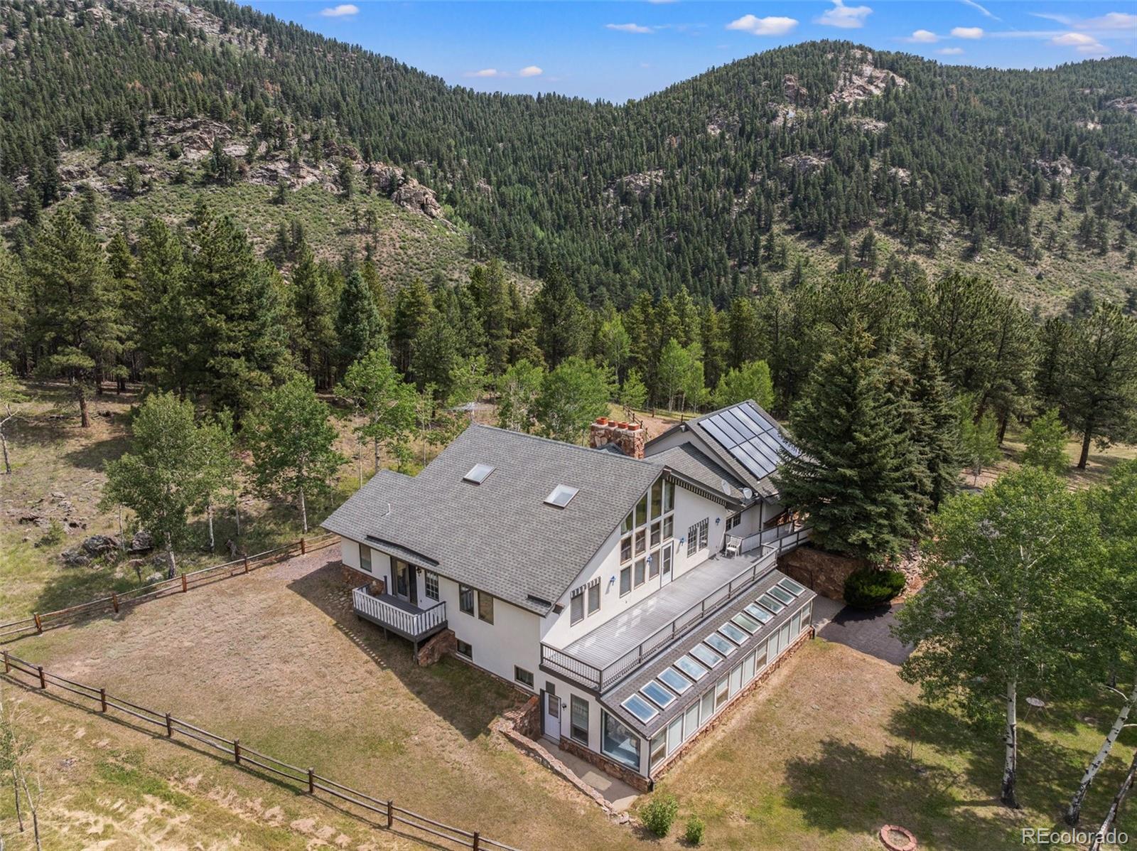 1680 Crow Valley Road Bailey, CO 80421 - Photo 48 of 50 an aerial view of a house