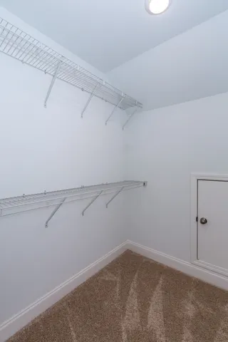 a view of a room with racks on the wall