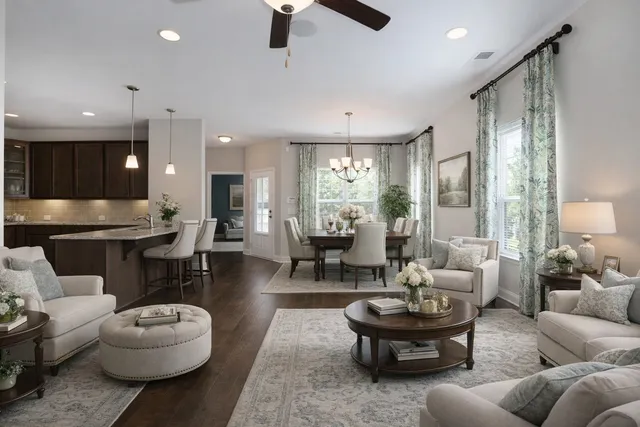 wooden floor in an empty room with a kitchen