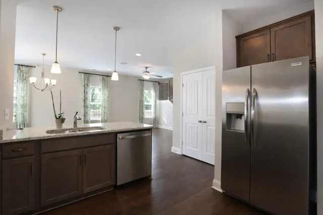 a bathroom with a sink vanity and a mirror