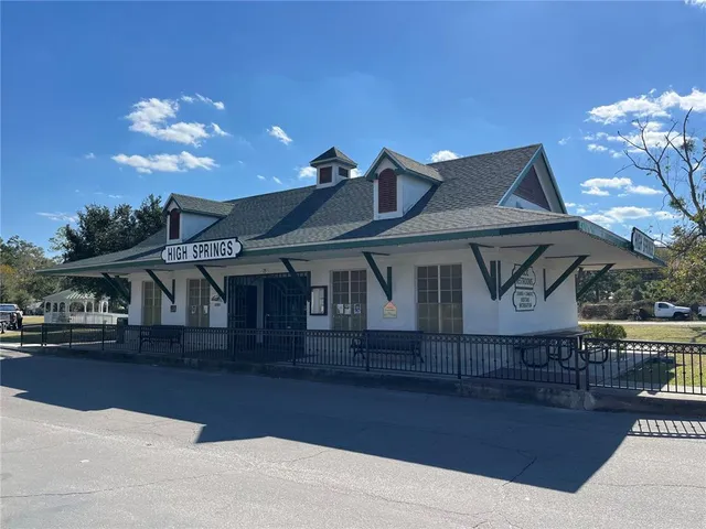 a front view of a house with yard