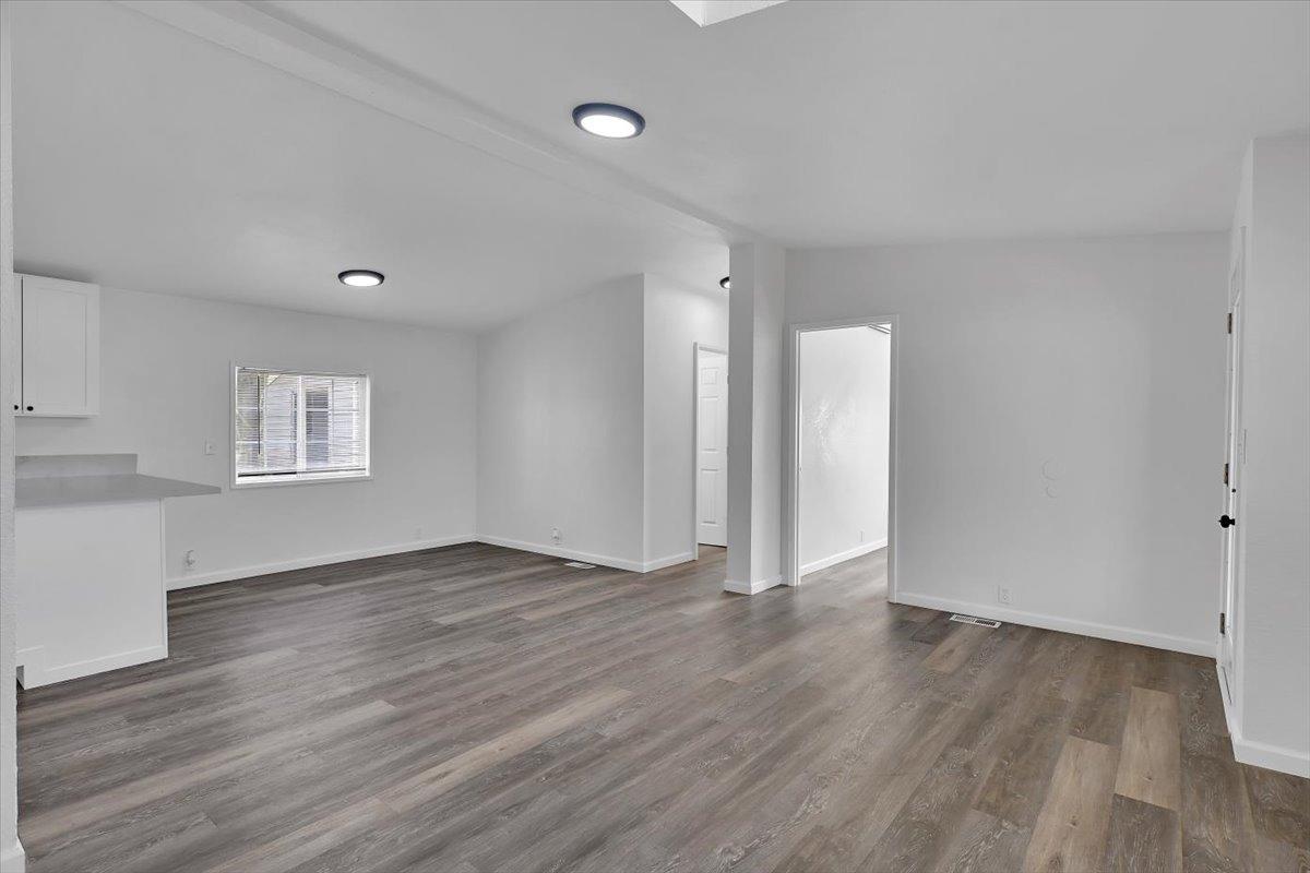 790 Los Verjeles Road Bangor, CA 95901 - Photo 38 of 97 an empty room with wooden floor and windows