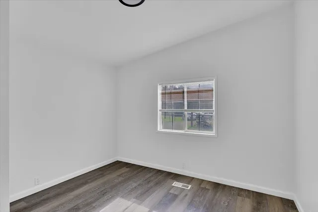 a view of a playground with a yard