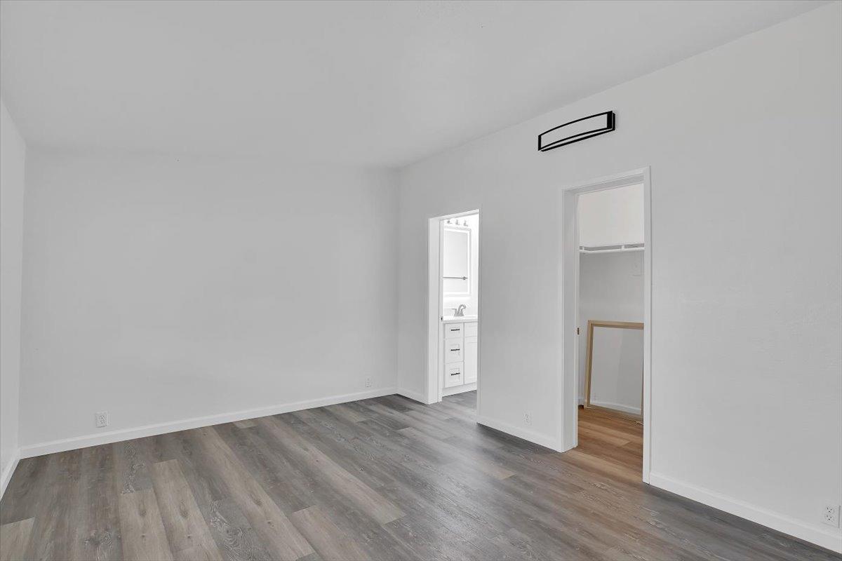 790 Los Verjeles Road Bangor, CA 95901 - Photo 45 of 97 an empty room with wooden floor and windows