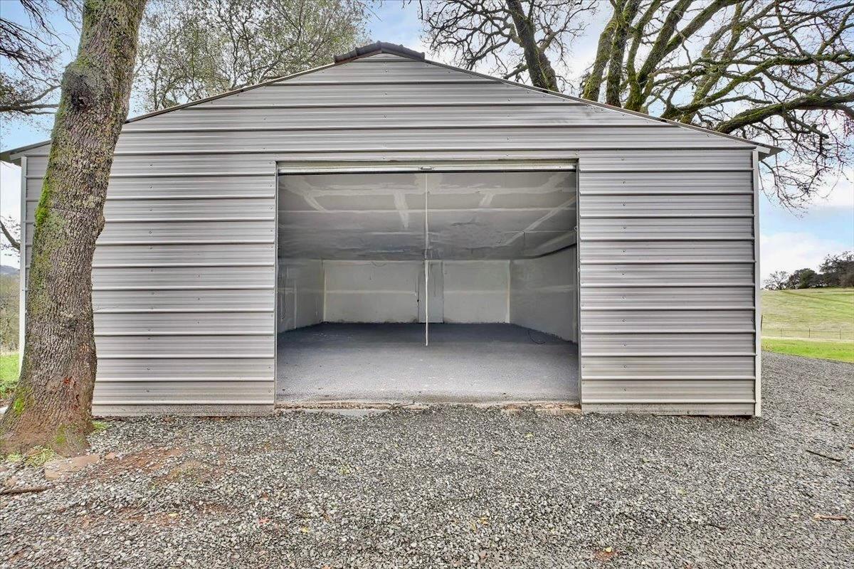 790 Los Verjeles Road Bangor, CA 95901 - Photo 48 of 97 a view of a house with a yard and garage