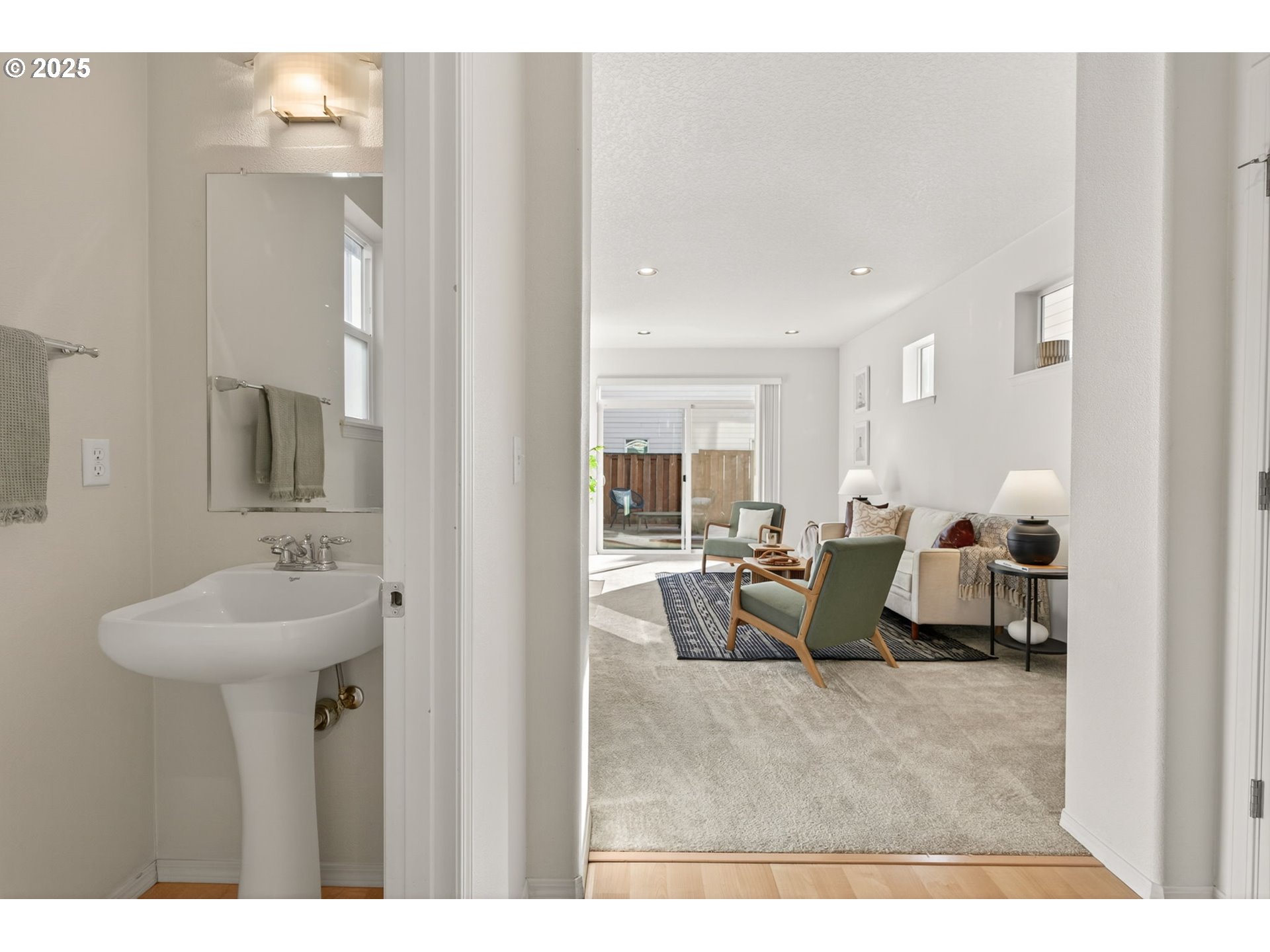 6262 Southwest 205th Avenue Beaverton, OR 97078 - Photo 11 of 36 a living room with furniture and a mirror
