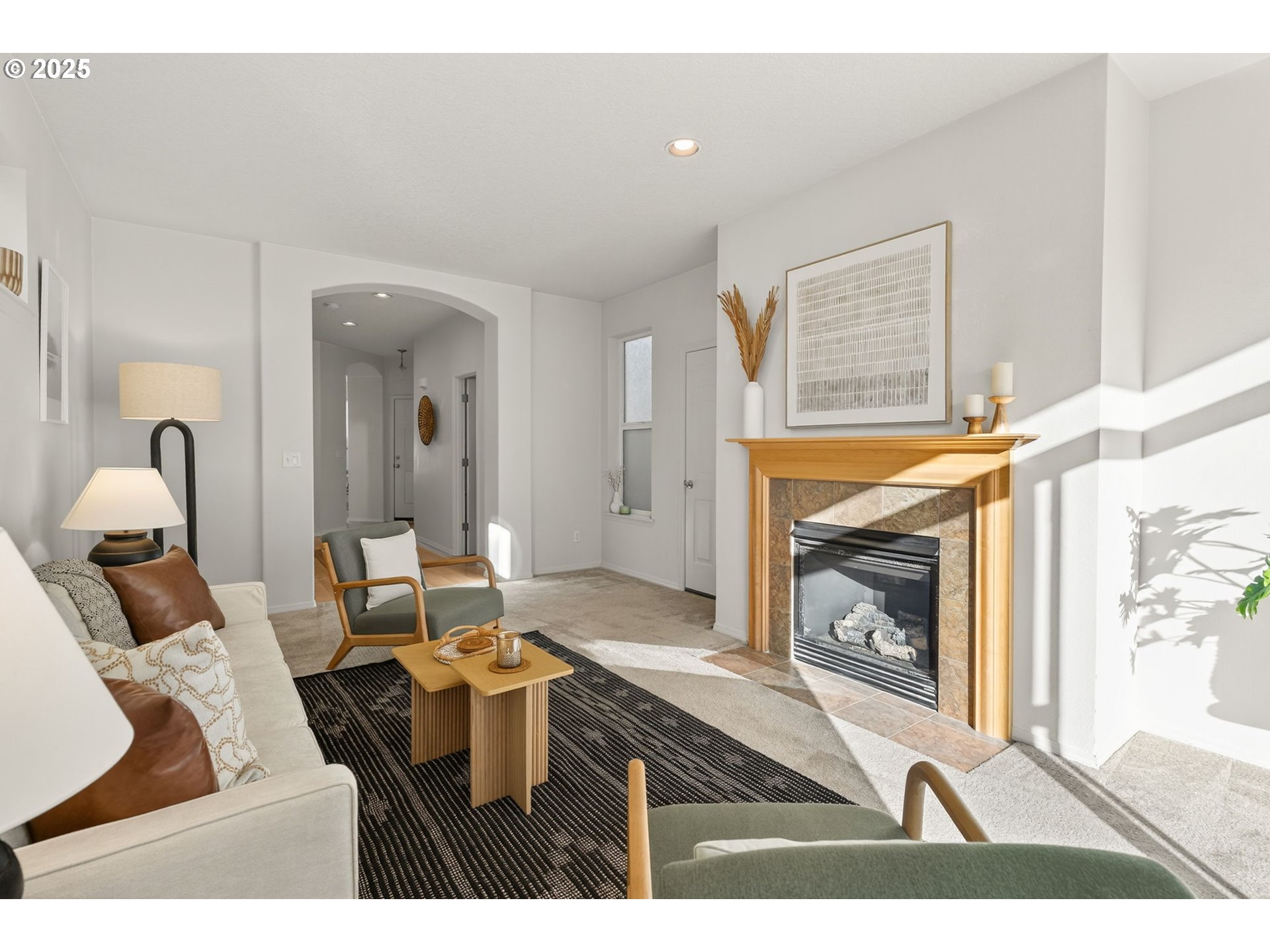 6262 Southwest 205th Avenue Beaverton, OR 97078 - Photo 15 of 36 a living room with furniture and a fireplace