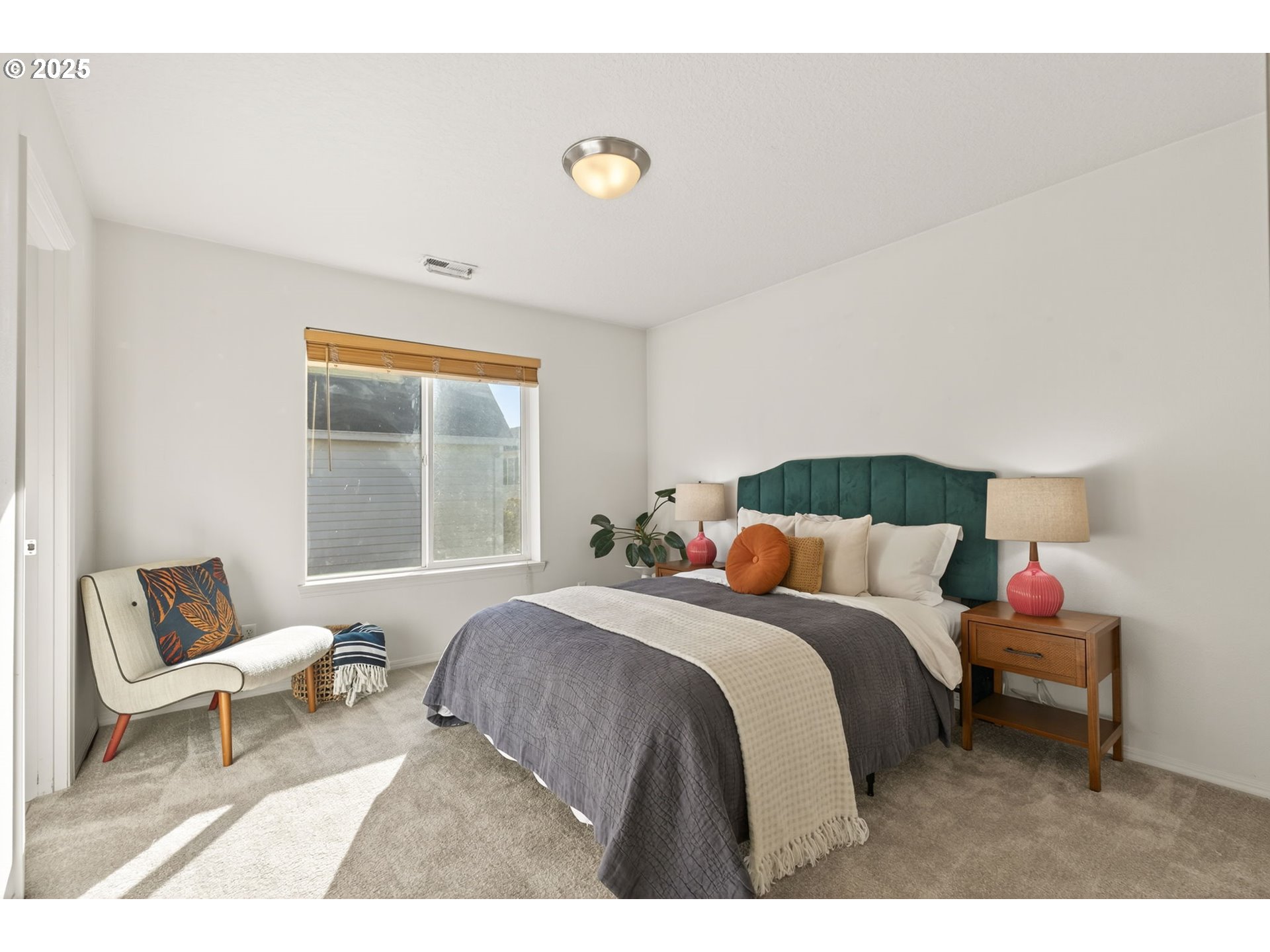6262 Southwest 205th Avenue Beaverton, OR 97078 - Photo 29 of 36 a bedroom with a bed and wooden floor