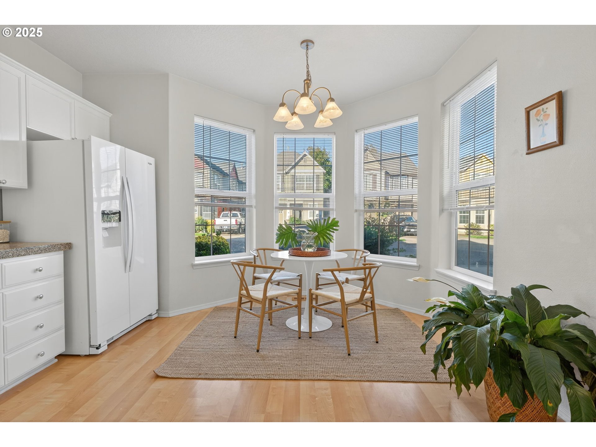 6262 Southwest 205th Avenue Beaverton, OR 97078 - Photo 9 of 36 a living room with furniture dining table and a large window
