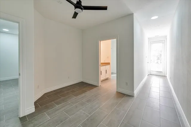 a view of an empty room and window