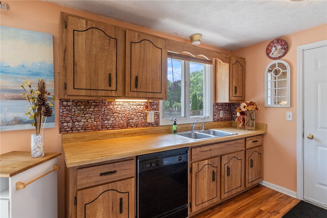 64 Elmford Road Gates, NY 14606 - Photo 11 of 37 A great view of the rear yard from the kitchen win